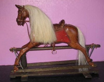 mahogany miniature rocking horse